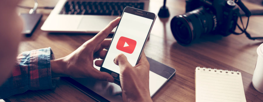 Creative or producer planning about his upload video to youtube and Editing vlog of his on laptop and camera for youtube | YouTube Profit Plan | RM Warner Internet Law Firm