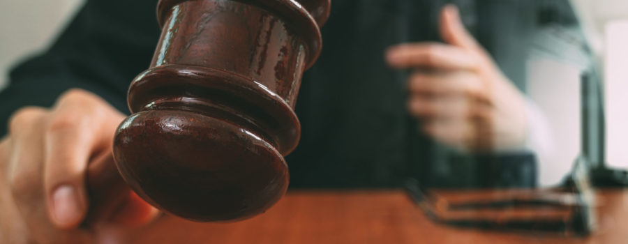 judge hitting wooden gavel | RM Warner Inernet Law Firm
