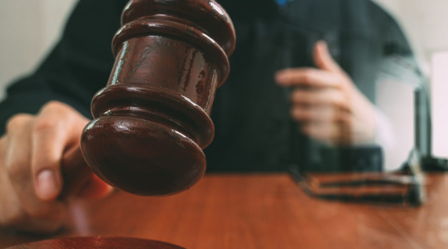 judge hitting wooden gavel | RM Warner Inernet Law Firm