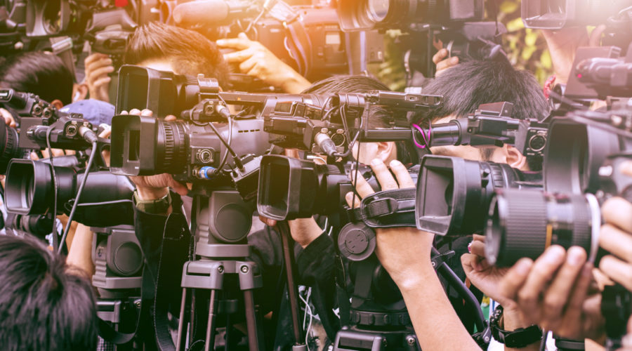 large number of press and paparazzi in broadcasting event | RM Warner Inernet Law Firm
