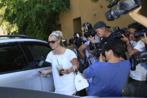 britney spears opening car door while paparazzi follows her and photographs her | RM Warner Inernet Law Firm
