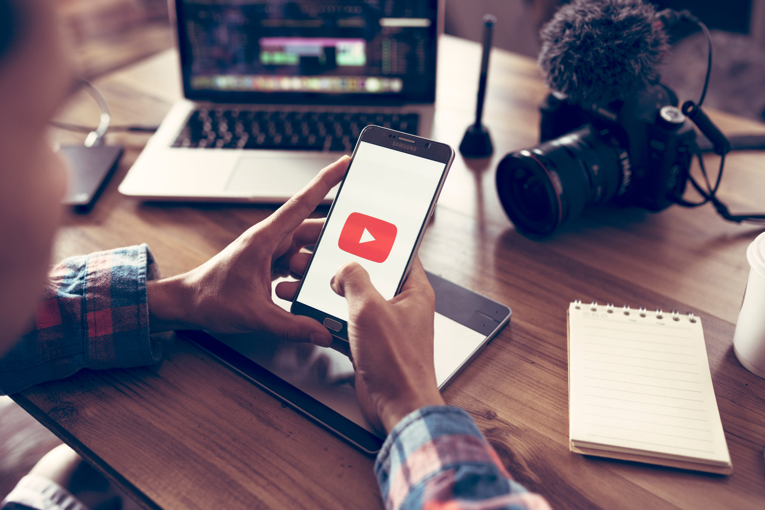 Creative or producer planning about his upload video to youtube and Editing vlog of his on laptop and camera for youtube | YouTube Profit Plan | RM Warner Internet Law Firm